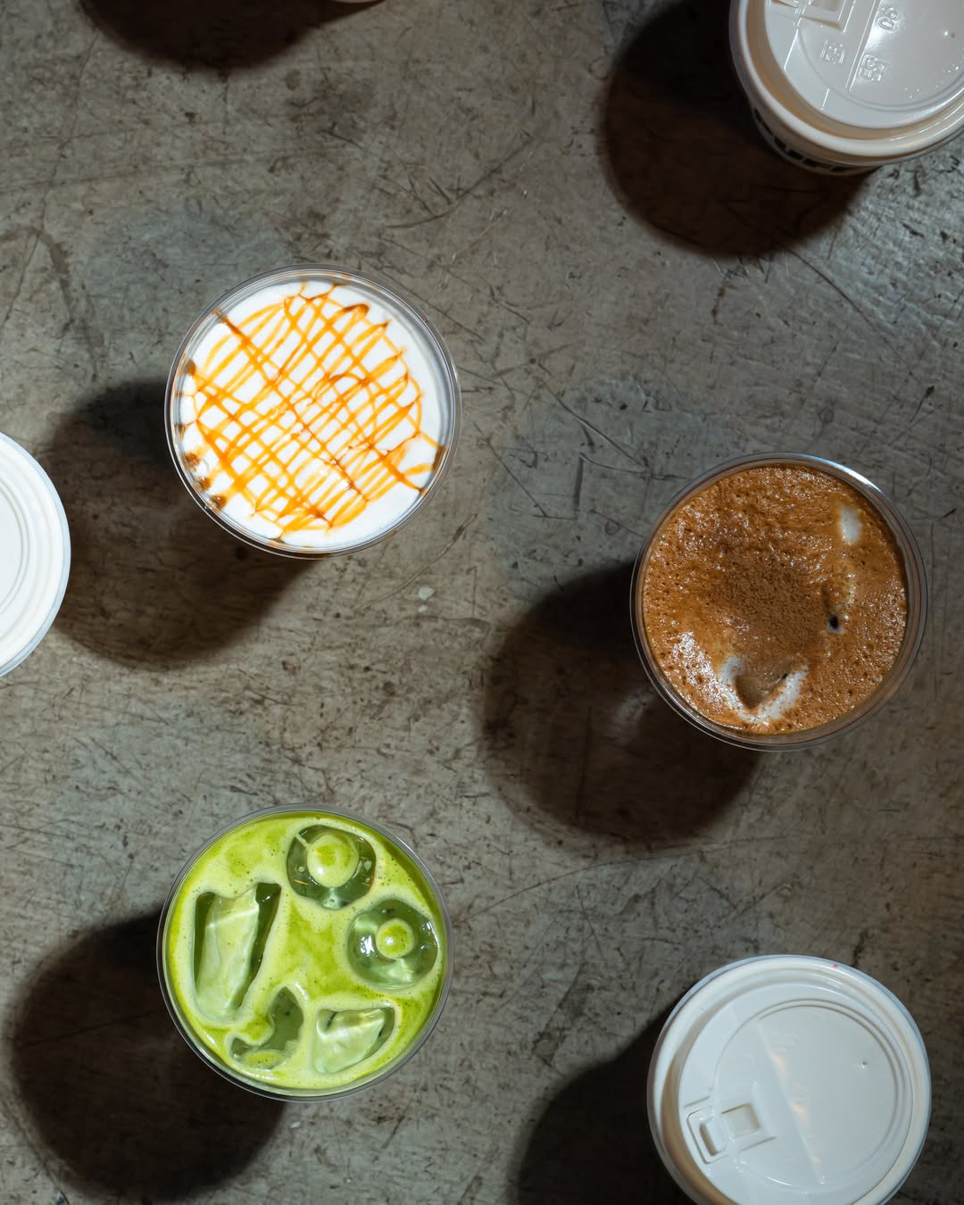 Top-down view of PUFF drinks on a table
